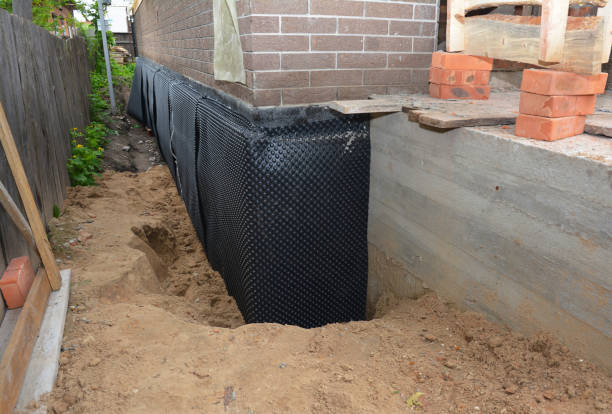 Happy homeowners after waterproofing job in Summertown